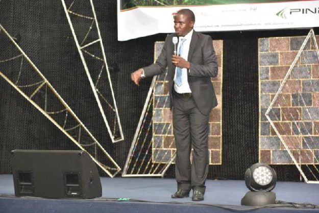 Zigha Ayibakuro speaks at a business linkages forum in Yenagoa, Bayelsa, organized by PIND to promote good business practices that yield profits
