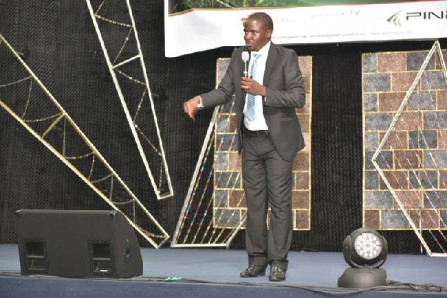 Zigha Ayibakuro speaks at a business linkages forum in Yenagoa, Bayelsa, organized by PIND to promote good business practices that yield profits